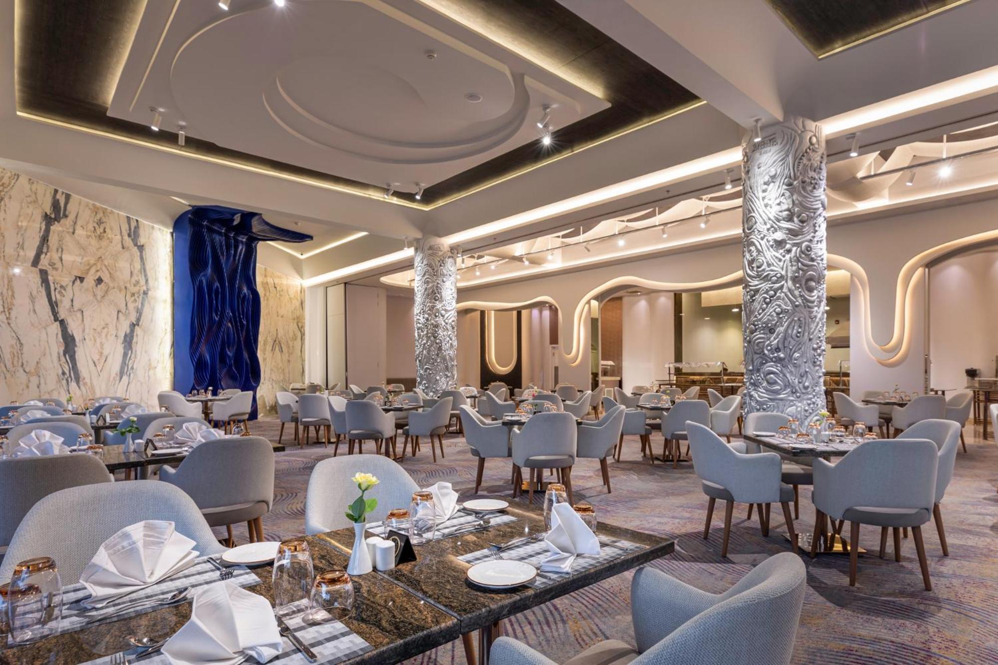 Mirage Hotel & Conference Center Alexandria Exterior foto The restaurant